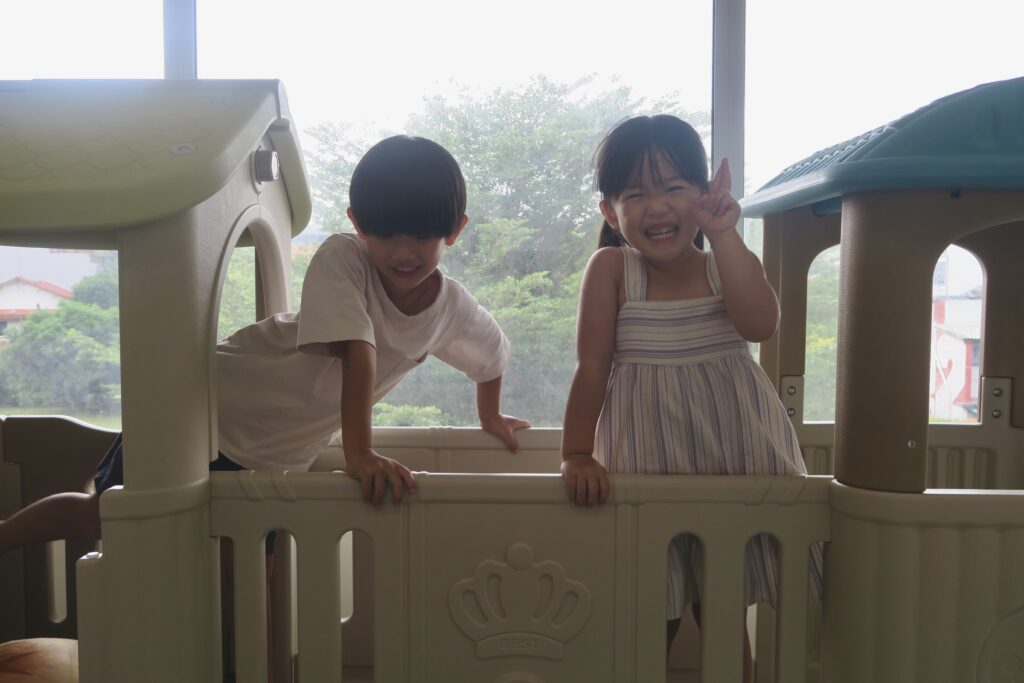 Singapore parent observing toddler for autism signs at home